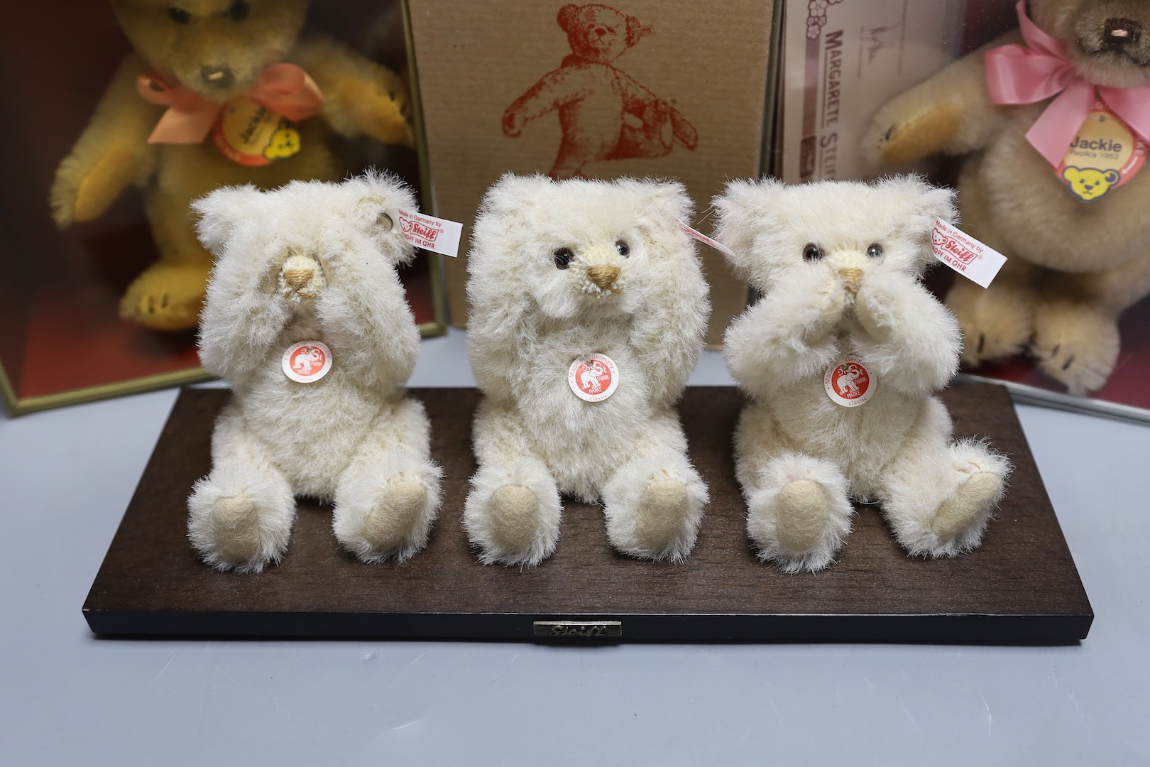 White label, three white bears on base 'See no evil' etc., a white label Jackie Bear, box/cert. 15cm, a white label Jackie Box No. Cert. and a yellow label miniature 12cm box/cert.